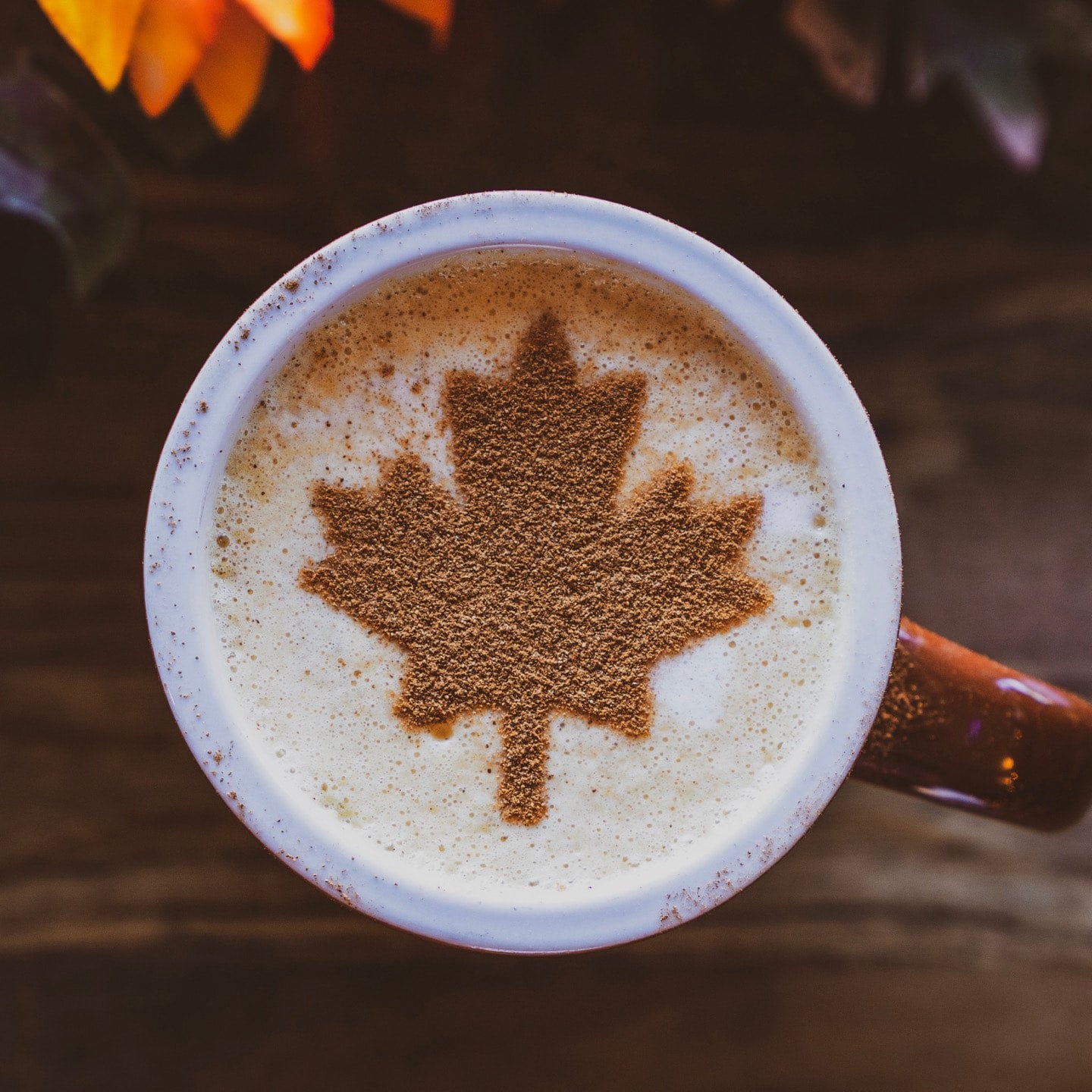 Coldspoon Cinnamon Maple Latte with oat milk, topped with a cinnamon maple-leaf design